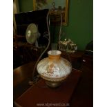 A hanging lantern oil lamp.