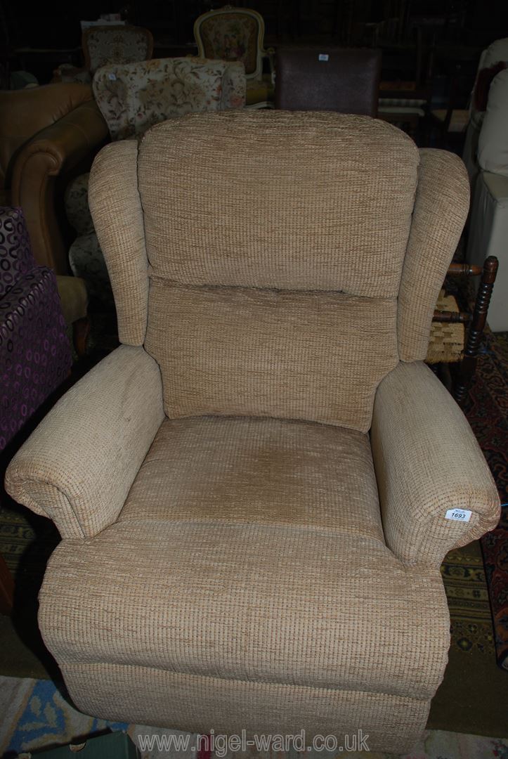 A beige upholstered 'Sherborne' electrically operated reclining and lifting Armchair,