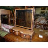 A circa 1900 Mahogany swing Mirror with bow style front and two drawers a/f., 22 3/4" x 26" x 9".