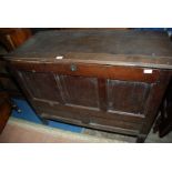 A dark Oak Mule Chest having plain panelled front, 44'' long x 20'' deep x 34 1/2'' high.