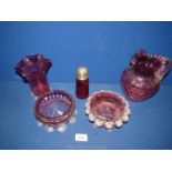 A small quantity of cranberry glass including; jug, fluted vase, sugar sifter, etc.
