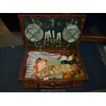 A Brexton wicker picnic hamper complete with china crockery and cutlery for six, Thermos flasks etc.