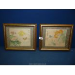 A pair of oriental framed Silks depicting butterflies and flowers, 13" x 10 1/2".