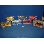 A box of Corgi model buses in good condition, boxed.