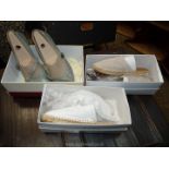 A pair of lady's size 40 beige suede slip on casual shoes,
