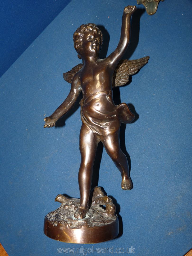 A cast metal figure of a cherub, 14'' tall and a metal figure of a man holding a bird, a/f, - Image 3 of 3