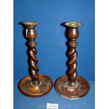 A pair of Treen barley twist candlesticks, 10 1/2'' tall.