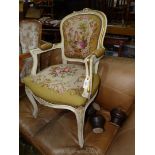 An elegant painted framed fauteuille/open armed elbow Chair having attractive floral tapestry