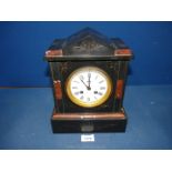 An elegant polished black stone and deep rose Marble mantel/bracket Clock having an enamelled white