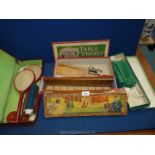 A box of vintage games including Table Tennis, Tiddly Tennis, Table Cricket, Bob's Bridge Game etc.