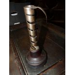 A treen and wrought iron spirally adjustable Candlestick,