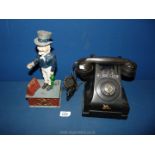 A vintage Bakelite Telephone and an Uncle Sam money box