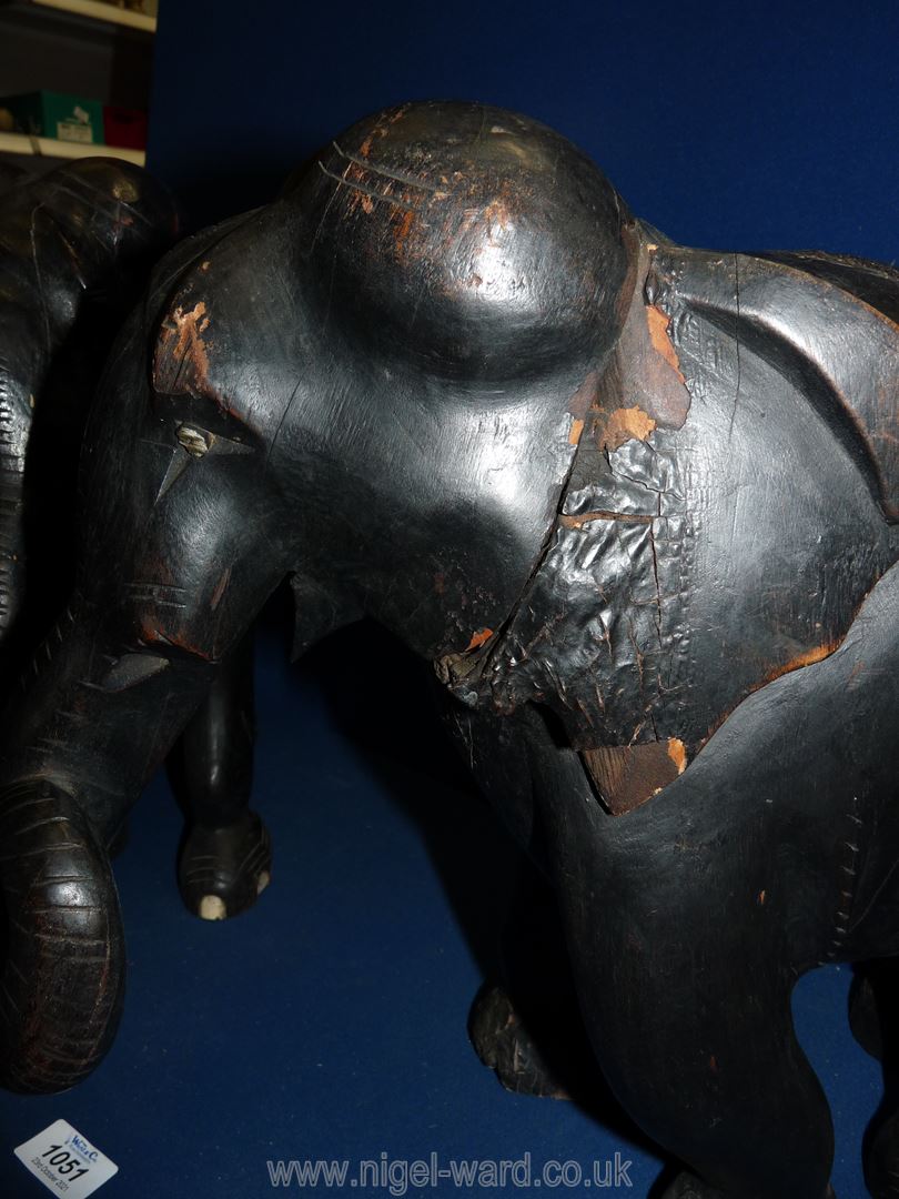A pair of large and heavy ebonised Elephants, both a/f with large wood splits/losses, - Image 2 of 5