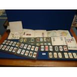 A quantity of Cigarette Card Albums including George VI coronation, The Victory Stamp Album,