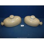 Two Denby stoneware hot water bottles - 2 pint and 1 1/2 pint,