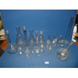 A large quantity of laboratory glass to include; test tubes, petri dishes, Bunsen burner.