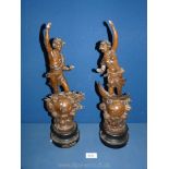 Two cast metal figures 'Le Soir' and 'Le Matin', marked 'Asco verso, 17 1/2'' tall.