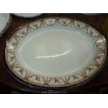 A Royal Worcester meat plate, worn at the rim. 18 3/4" x 12 3/4".