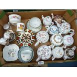 A quantity of small ornamental teapots and cups and saucers including Crown Staffordshire coffee