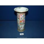 An oriental Famille Rose gently tapering cylindrical Vase flared rim and depicting butterflies,