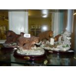 Three Juliana Collection figures of bears including Mother feeding her cub fish,