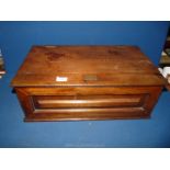 A Mahogany storage Box with attached brass plaque engraved "Alan T.