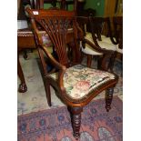 A circa 1900/Edwardian Mahogany framed open armed elbow Chair featuring marquetry,