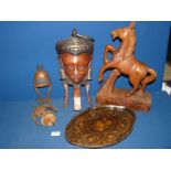 A quantity of wooden masks, carved horse, wool winder etc.