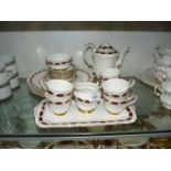 A Paragon bone china 'Elegance' coffee set including six cups and saucers, coffee pot and cream jug,