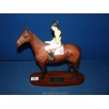 A Beswick figure of Arkle with 'Pat Taaffe Up'. 12 3/4" tall.