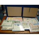 Two folders of Russian and American share certificates from mining, chemical industries etc,