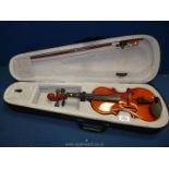 A Violin, 1/4 size, in soft lined case with bow, one string a/f.