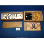 A wooden box containing wooden chess pieces (complete), together with a wooden box of Domino's.