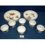 Two Royal Worcester Evesham gold flan dishes; one 9", the other 7 1/2" and 6 ramekin dishes.