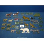 A quantity of lead Zoo and Farm Animals and fencing including Rhino, Elephant, Bear, Sheep,
