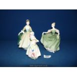 Three Royal Doulton figurines; Michele, Elegance and Babie.