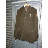 A military Jacket with badges for Royal Engineers and Royal Air Force Commonwealth Squadron,