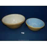 A large Mason Cash mixing bowl, 13'' diameter and one other smaller bowl.
