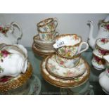 A Dresden floral and gilt part Teaset to include four cups, nine saucers and nine tea plates, a/f.