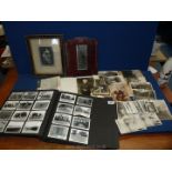 A small quantity of black and white photographs, small framed mirror, etc.