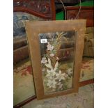 A fabric framed painted Mirror with floral scene and butterfly decoration, 25'' x 15''.