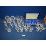 A quantity of cut glass including; Aperitif glasses, Tudor box set of glasses, brandy balloons,