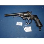 A Belgian proofed 9mm Pin fire drop-down six shot Revolver, having chequered ebony grips,