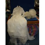 A Wedding dress with long sleeves, lace over layered bodice and netted undercoats, size small,