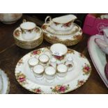 A quantity of Royal Albert 'Old Country Roses' dinnerware including six dinner plates,