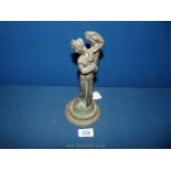A heavy bronze figurine of a lady, marked Italy, 9 1/2'' tall.
