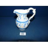 A Charles Meigh style blue & white relief moulded Jug depicting classical scenes (registration mark