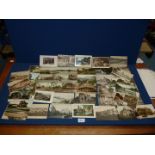 A quantity of Postcards with three panoramic cards.