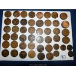 A quantity of pennies including pre 1906, the oldest visible at 1860, some well worn.