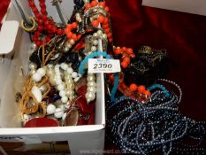 A quantity of beads, necklaces, chokers, etc.